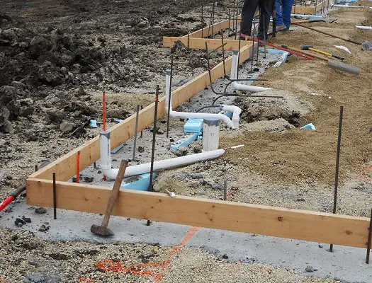 How Deep Are Plumbing Pipes Under A Slab House?